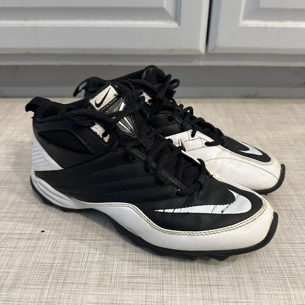 Nike Speed Shark 3/4 Football cleats in black and white.